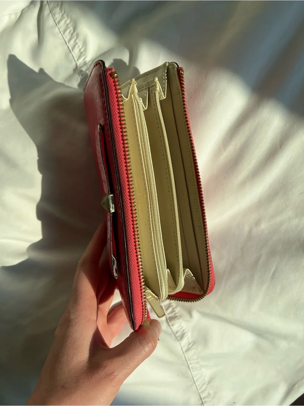 kate spade holly street Lacey zip-around wallet Coral/Pink